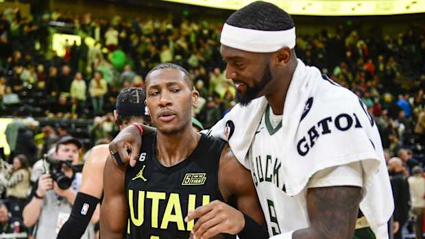 Utah Jazz guard Kris Dunn (11) congratulates Milwaukee Bucks forward Bobby Portis (9) 